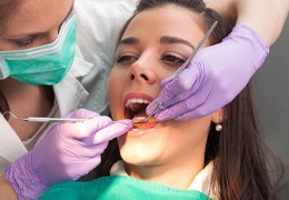 patient getting root canal therapy in Greater Inwood