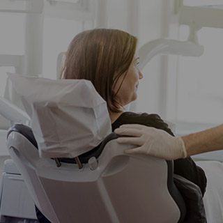 Woman in dental exam chair