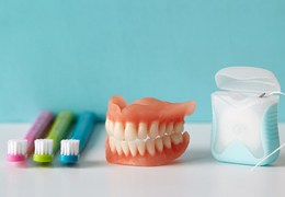 Oral hygiene products on a dental table.