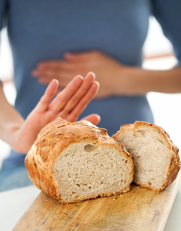 person with celiac disease saying no to bread